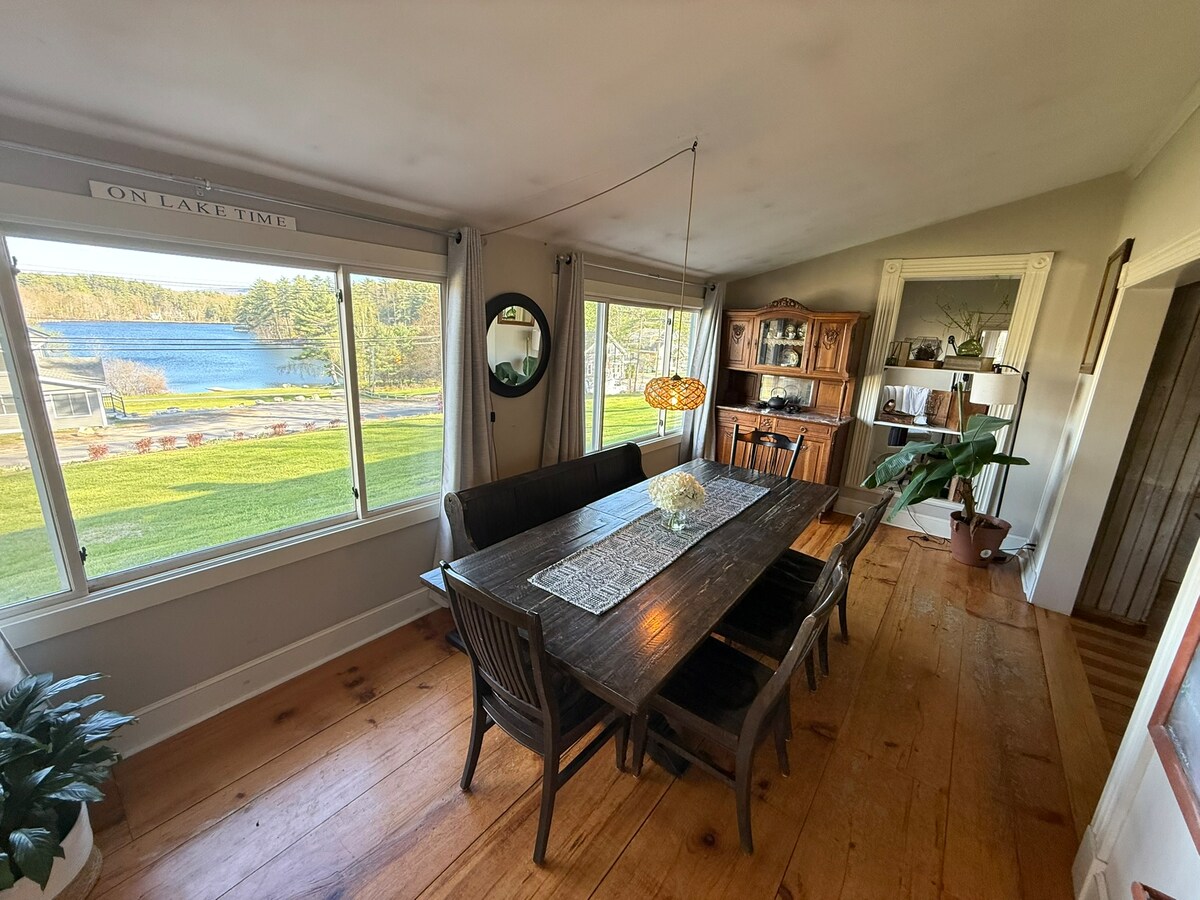 Dining room with Crescent Lake views through large windows